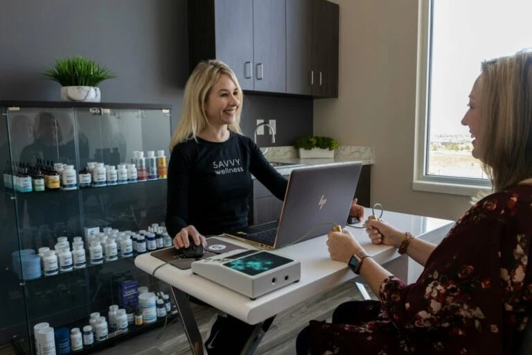 Working with a client at Savvy Wellness