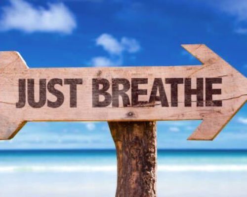 Sign that says "Just Breathe"