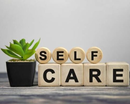 Self Care Spelled out in blocks