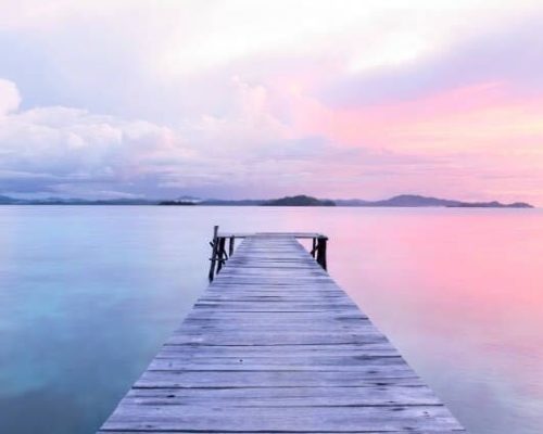 A dock at sunset